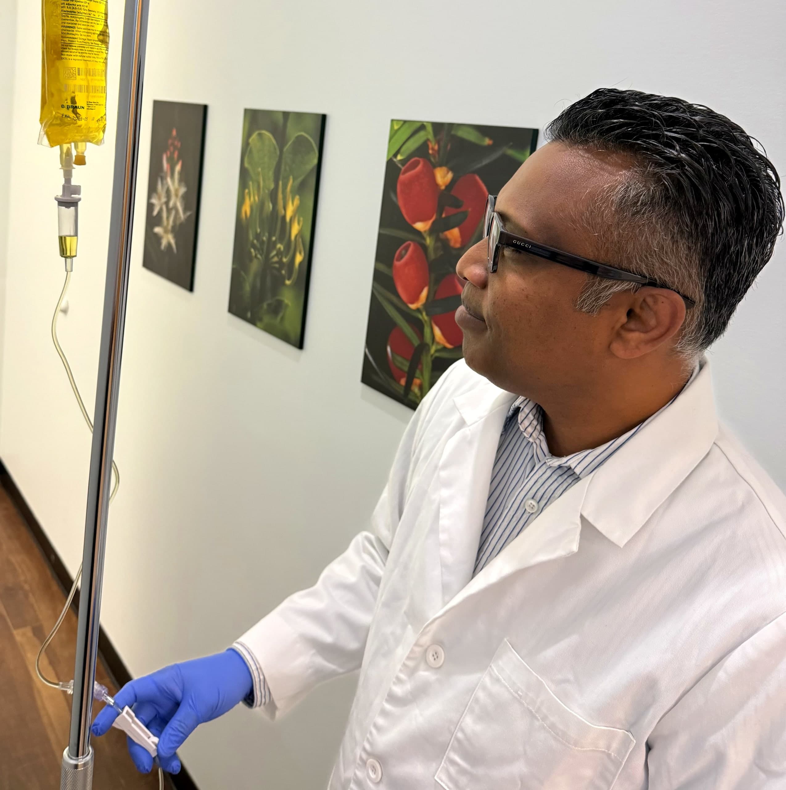 Dr. Morais monitoring patient during intravenous infusion session in Hamilton